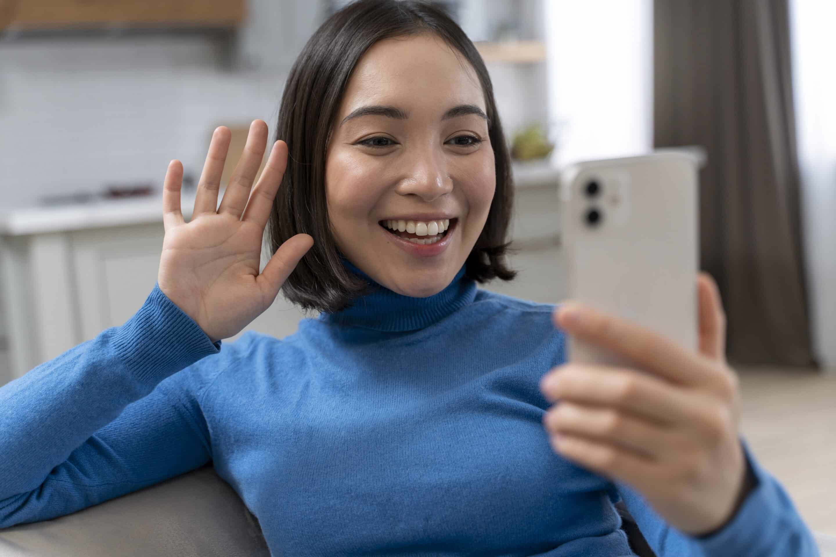 medium-shot-smiley-woman-with-phone